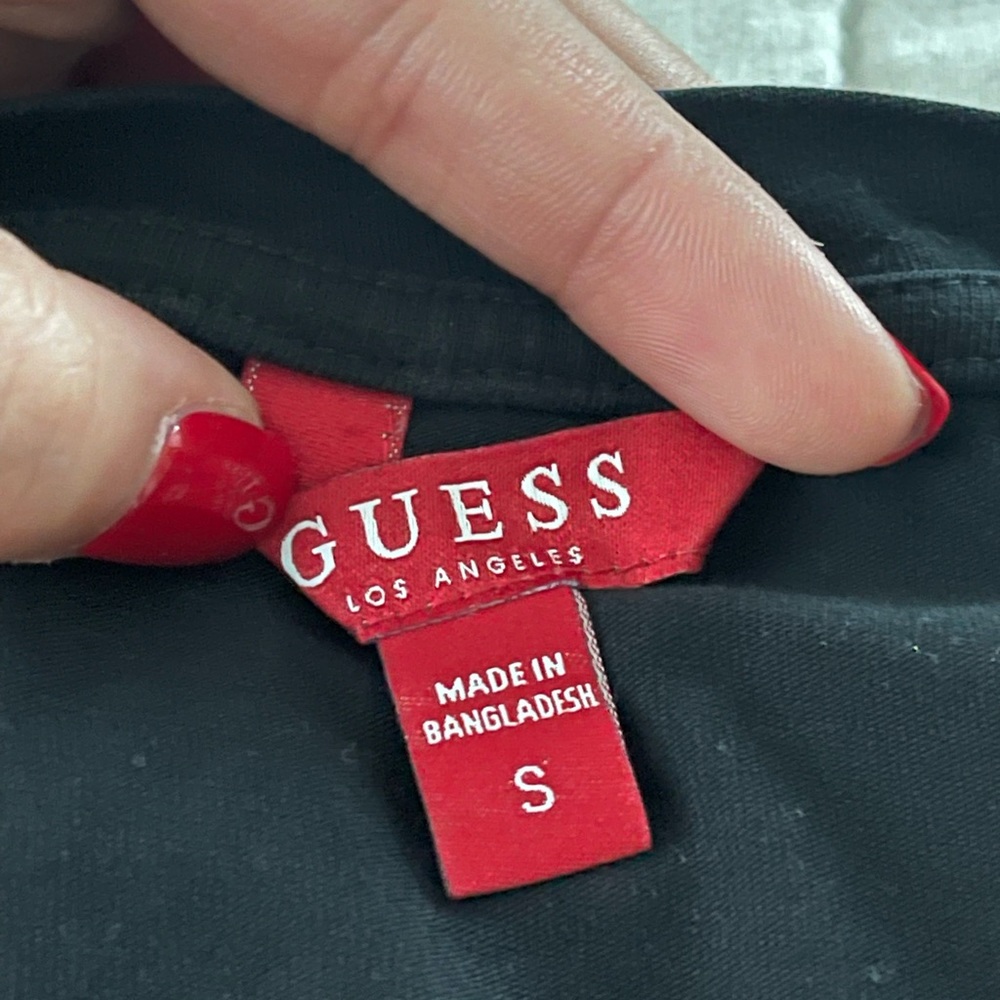 Guess button Top